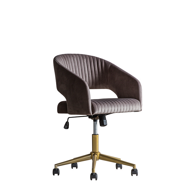 side on cut out image of curved warm velvet swivel chair