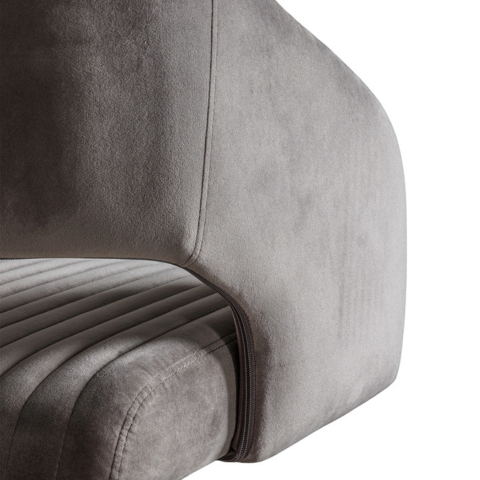 close up on warm grey velvet material of swivel office chair