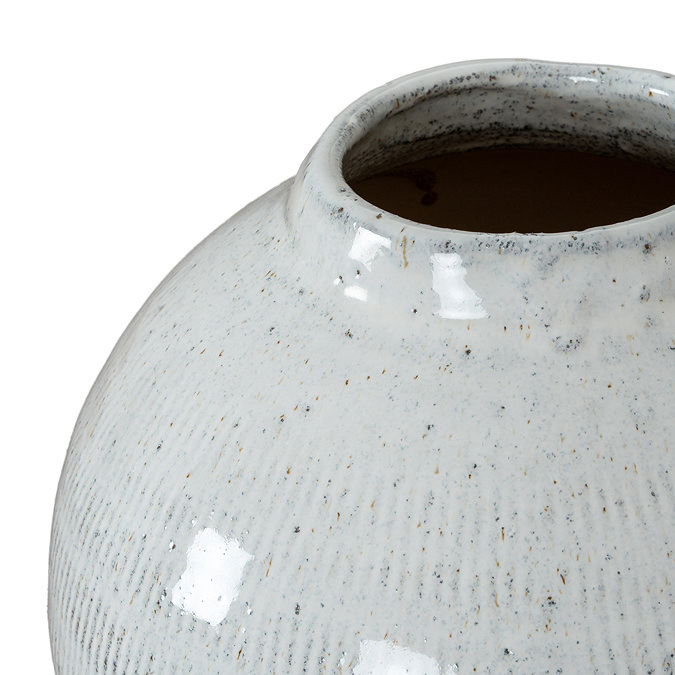 close up on mouth of olpe vase in white ceramic