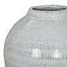 close up image of rounded edge of ceramic olpe vase