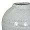 close up image of rounded edge of ceramic olpe vase
