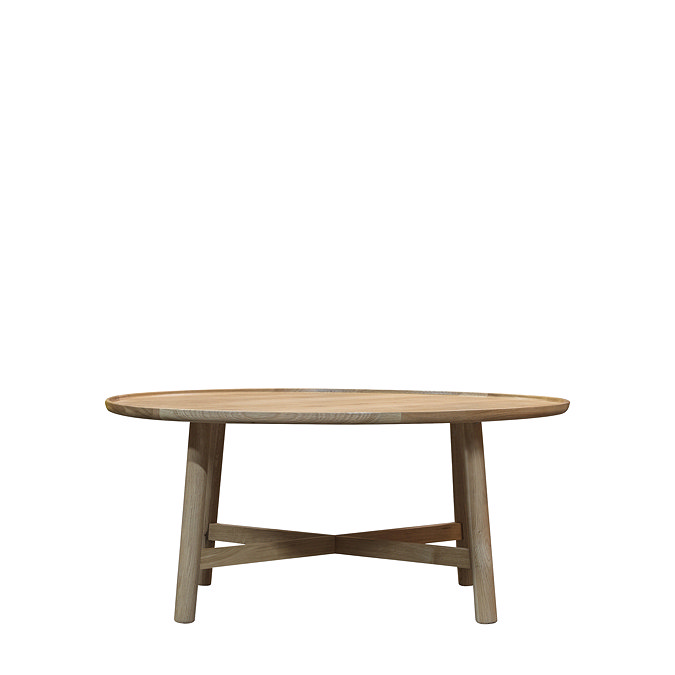 image of light oak round coffee table, cut out on white background