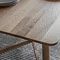 close up on smooth edge of solid oak dining table