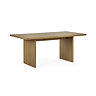image cut out on white background of rectangular oak dining table with fluted rectangular pillar legs