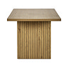 side on image cut out on white background of rectangular oak dining table with fluted rectangular pillar legs, focus on wooden grain fluted detail