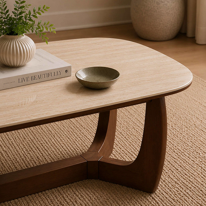 close up on smooth stone coffee table with walnut base