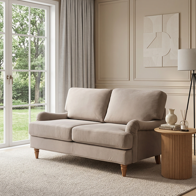 image of 2 seater mink coloured velvet sofa on plush rug