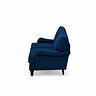 side on cut out image of navy blue velvet sofa with dark wood legs