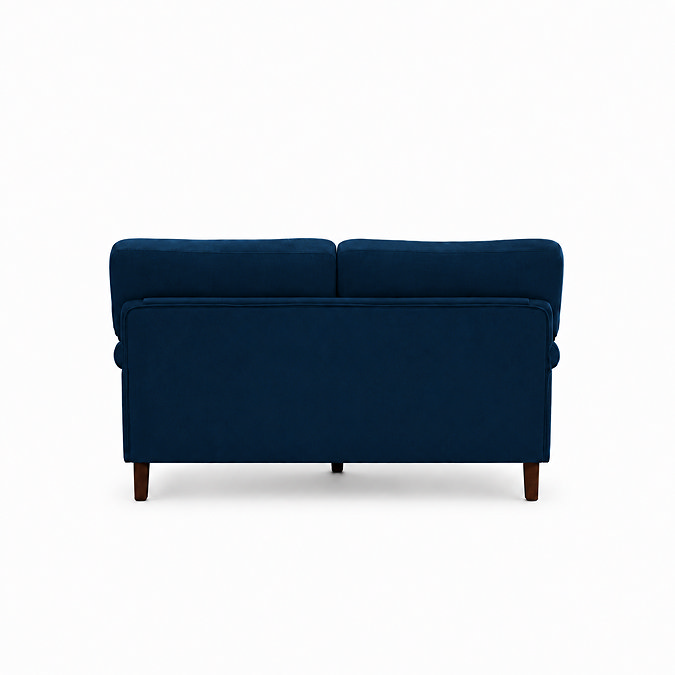 back facing cut out image of navy blue velvet sofa with dark wood legs