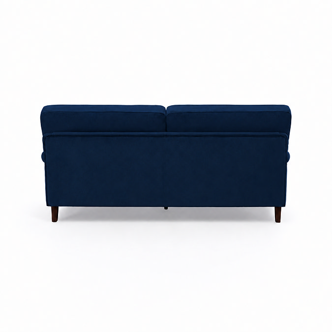back facing cut out image of navy blue velvet 3 seater sofa with dark wood legs
