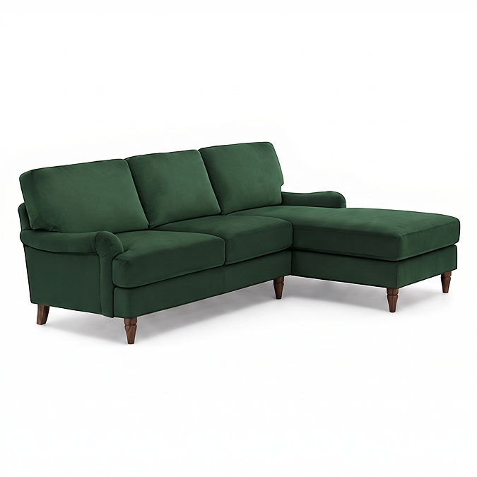 angled cut out image of velvet green corner sofa with dark wood legs
