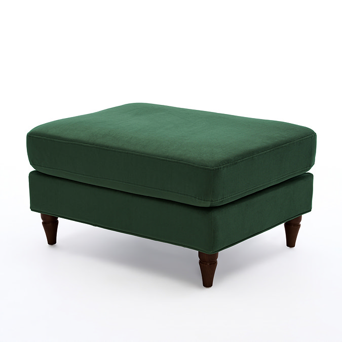 angled image of forest green velvet pouffe with dark wood legs