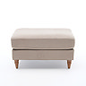 side on image of mink velvet pouffe with light wood legs