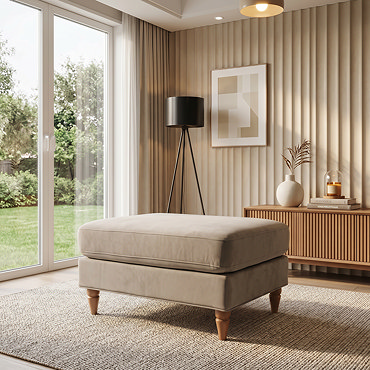 side on image of mink velvet pouffe with light wood legs