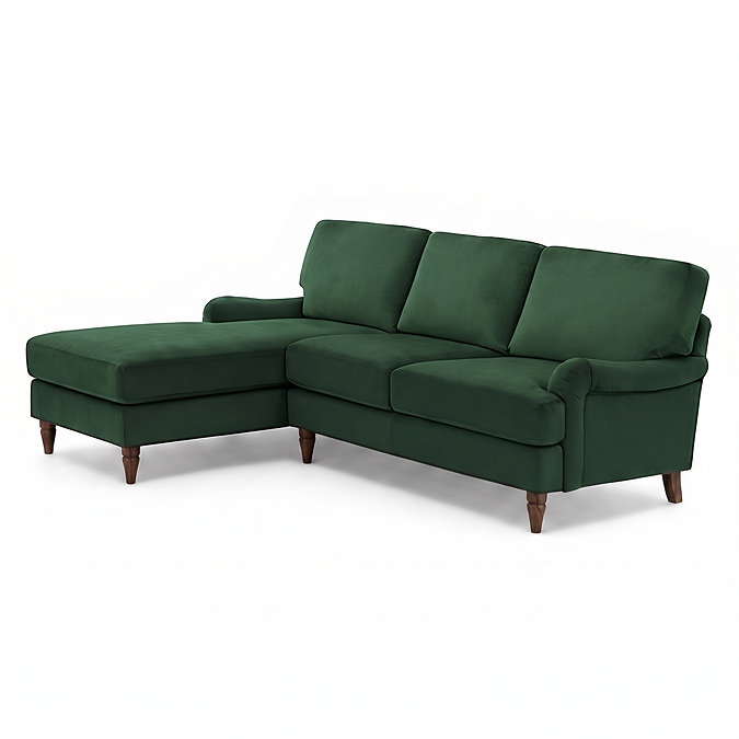 angled cut out image of green velvet corner sofa with dark wood legs