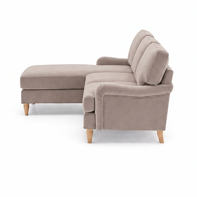 side on cut out image of mink coloured velvet sofa with light wood legs