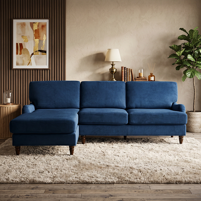 image of right seat corner sofa in navy blue velvet on plush rug of modern, warm-toned living room scene