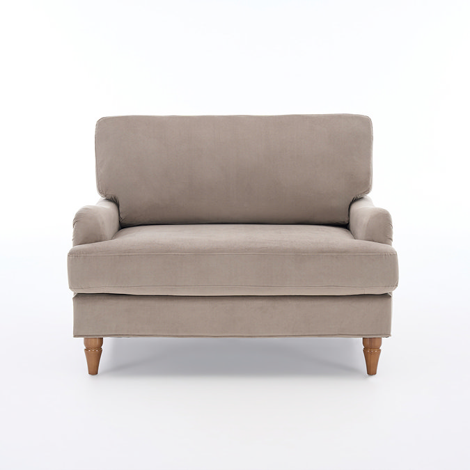 front on cut out image of mink coloured velvet snuggle chair