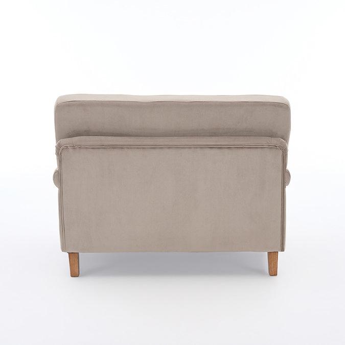 back facing cut out image of velvet mink coloured snuggle chair