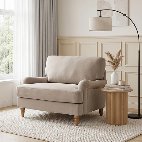 image of mink coloured snuggle chair with light wood legs