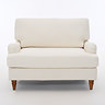 front on image of beige woven fabric snuggle chair with dark wood legs