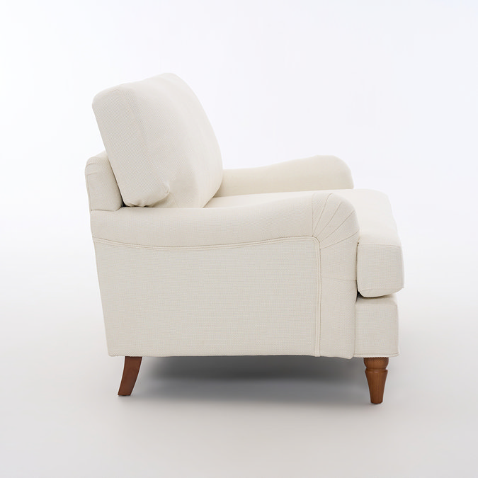 side on image of beige woven snuggle chair with dark wood legs