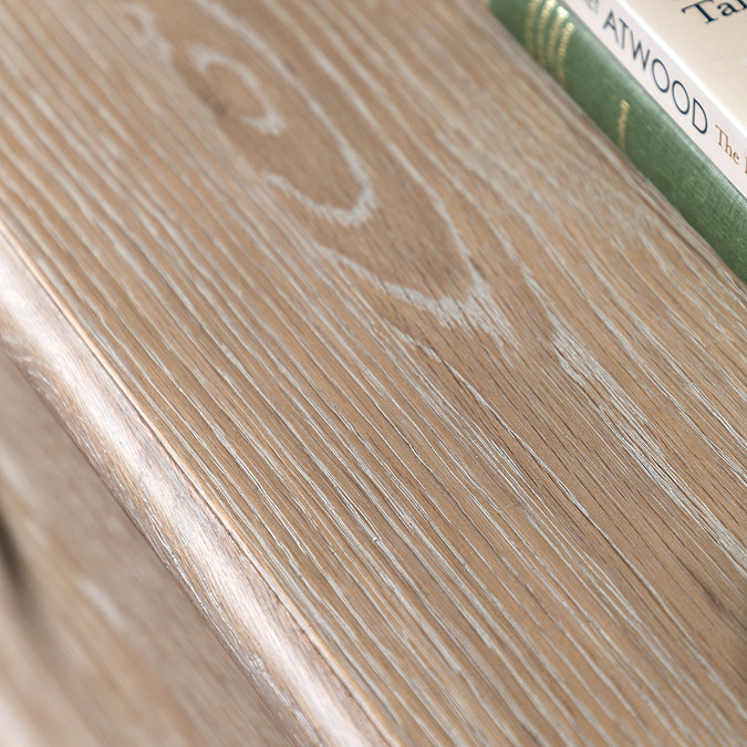 close up on limed oak surface of chest of drawers, highlighting colour and woodgrain texture