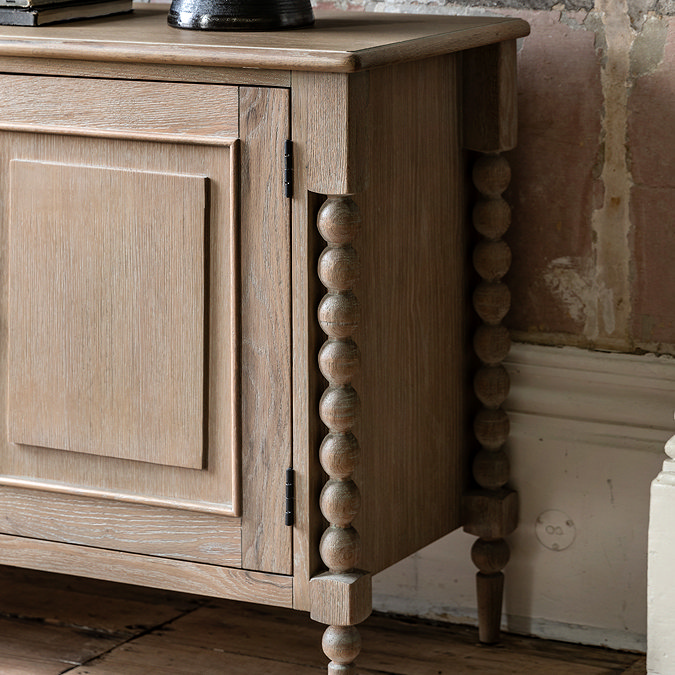 close up on limed oak sideboard with bobbin detailing on the edges