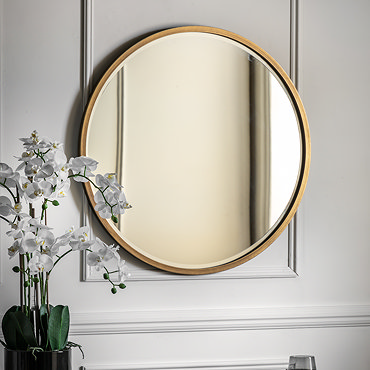 close up image of thin antique gold frame of mirror