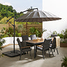 image of large grey parasol over 6 seat rectangular dining table