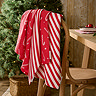 Tablecloths CAndy CAne on back of chair
