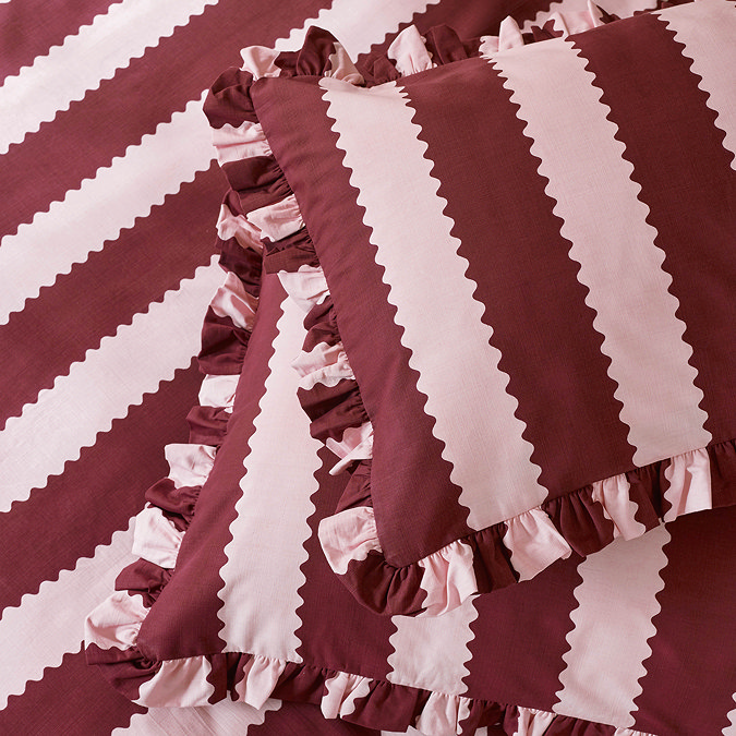 Candy Stripe Burgundy Duvet Cover Close Up on Pillows
