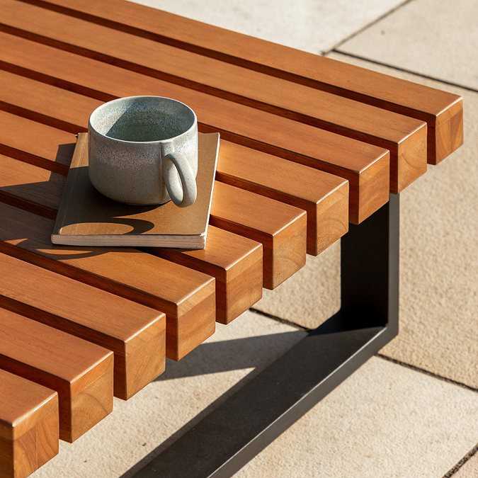 close up on eucalyptus slatted wood top of outdoor coffee table