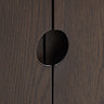 close up image of cut out in wood at centre of dark oak cabinet which acts as subtle handle