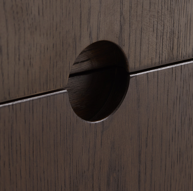 close up image of circular cut out handle of dark oak low-board