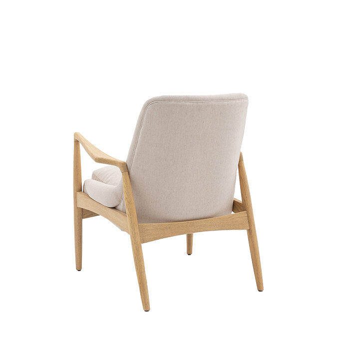 back image cut out of solid oak accent chair with linen cushions