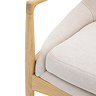 close up image on fabric and wood of accent chair