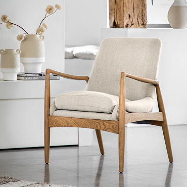 cut out image of solid oak accent chair with plush linen cushions