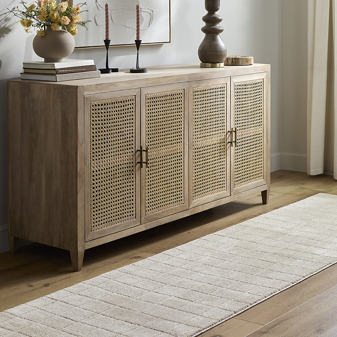 image of beige runner with square pattern on wood flooring in front of sideboard