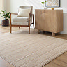 image of striped beige soft rectangular scandinavian rug on light wood floor