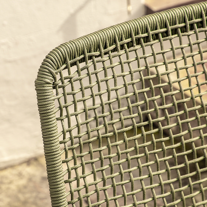 close up image of woven rope material of back of green garden chair