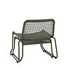 back image cut out of woven green garden chair with matching footstool tucked underneath