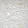 close up on chevron pattern of white ceramic table lamp base