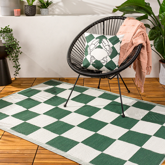 Checkerboard rug in green on floor image  2