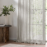 Cirrus Tab Top Sheer Curtain Panel in Grey over a window image