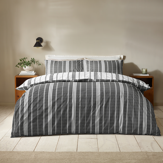 Harbour Stripe Duvet Cover Set in black on bed image 1