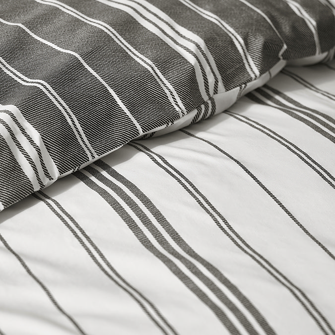 Harbour Stripe Duvet Cover Set close up in black on bed image 1