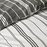 Harbour Stripe Duvet Cover Set close up in black on bed image 1