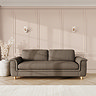 lifestyle image of grand sofa in chenille-velvet fallow fabric with light feet and sculpted arms