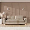 lifestyle image of grand sofa with sculpted arms and light oak feet in a latte coloured fabric